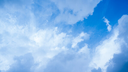 Clear Blue Sky with Soft White Clouds – Natural Background