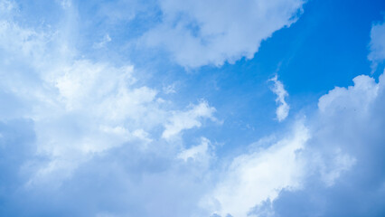 Clear Blue Sky with Soft White Clouds – Natural Background