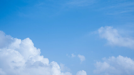 Clear Blue Sky with Soft White Clouds – Natural Background
