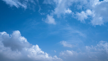 Clear Blue Sky with Soft White Clouds – Natural Background