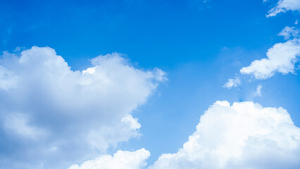 Clear Blue Sky with Soft White Clouds – Natural Background
