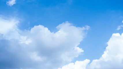 Clear Blue Sky with Soft White Clouds – Natural Background