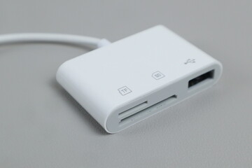 Kudus, 13 Maret 2025 - SD Card Camera Reader Adapter,Flashdisk to Apple iphone . isolated on white background.