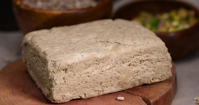 halva made from roasted sunflower seeds and crushed into one solid mass, a sweet delicious dessert made from fried sunflower seeds