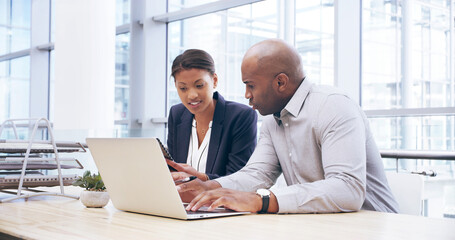 Laptop, discussion and business people in office for research with company investment, profit or revenue. Meeting, computer and team of financial managers planning for finance proposal with report.