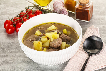 Soup with meatball and potato