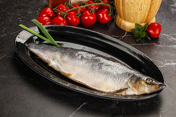 Whole raw salted herring fish