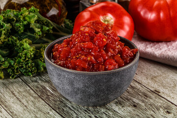 Diced ripe tomato with sauce