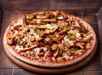 Gyros Pizza with jalapeno pepper and mozzarella cheese. Soft focus. Close up.