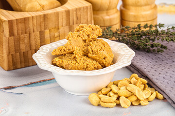 Crunchy peanut butter fat product