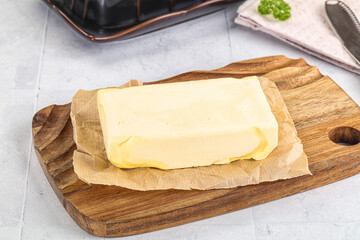 Dairy butter piece over board