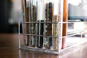 Selective Focus Dried Herb Seeds in Vitro, Scientific Test Tubes, Dried Coriander Seeds, and Various Herbs in the Laboratory, Extracting Aroma from Herbs