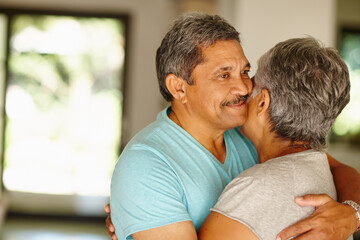 Fototapeta premium Care, senior or happy couple hug in home for support, retirement or anniversary together. Smile, healthy marriage or elderly people in house for trust, embrace or bonding for love, comfort or romance