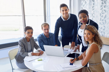 Confident, portrait or business people in meeting with graphs, data analytics or charts paperwork....