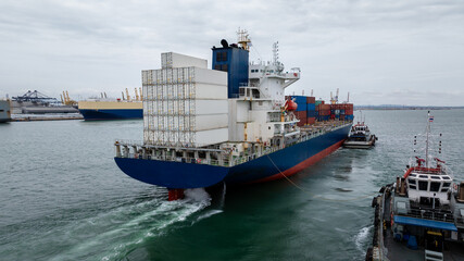 shipping container carrier container sailing in ocean, global business and industry delivery service of cargo logistics import export of international by ship freight transportation worldwide.