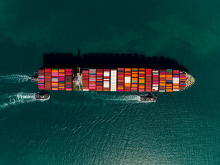 shipping container carrier container sailing in green sea, global business and industry delivery...