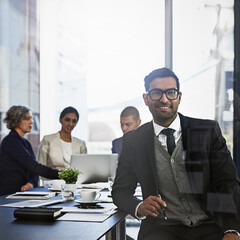 Leadership, portrait and smile of business man in boardroom with colleagues for meeting or project...