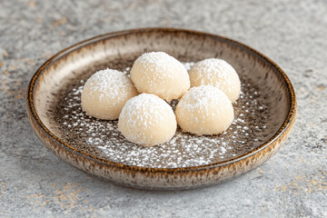 Buttery Snowball Cookies with Sweetened Condensed Milk and Powdered Sugar Coating