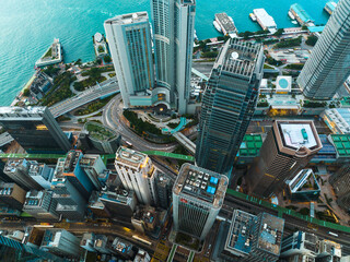 An aerial panorama captures Hong Kong city's impressive skyscrapers and urban density.  Buildings...