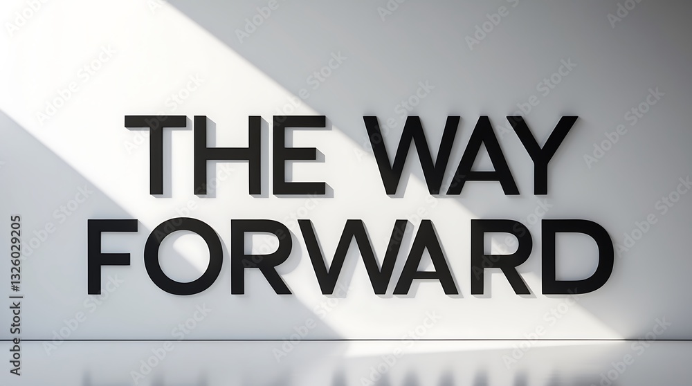 Poster text on a white wall casting shadows of light in a modern setting