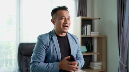 Professional businessman in stylish blue blazer and black shirt talking with teamwork. He exudes confidence and leadership before walk out, He confidence and leadership and inspirational themes.