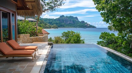 A luxurious beachfront villa with a private infinity pool digital