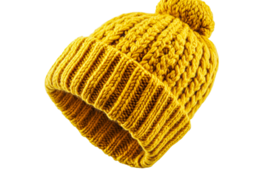 Warm knitted yellow beanie with pom pom for winter wear