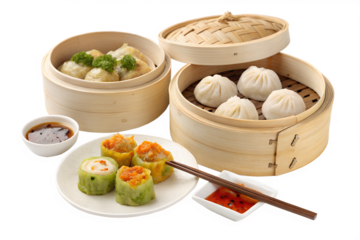 Asian dim sum in traditional bamboo steamer baskets isolated on transparent background