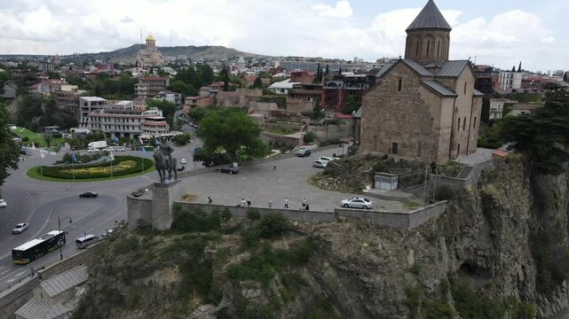 Aerial video above Tbilisi city on a sunny day