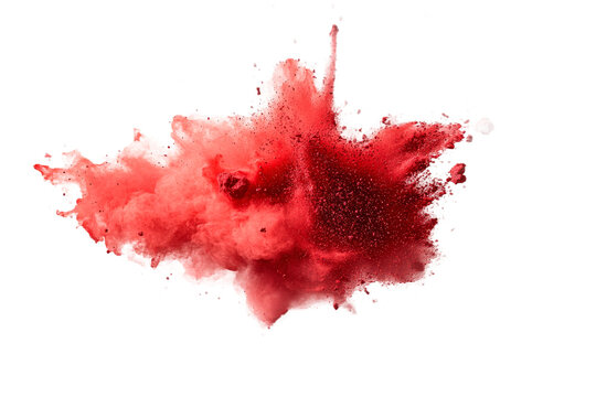 Red powder explosion creates vibrant artistic splash