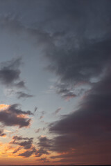 Beautiful atmospheric dramatic clouds in the evening at sunset.