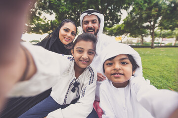 Happy family spending time together outdoor in Dubai