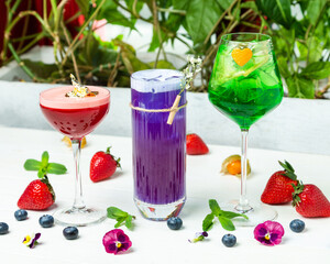 Summer refreshing bright cocktails with ice, restaurant. Horizontal frame.