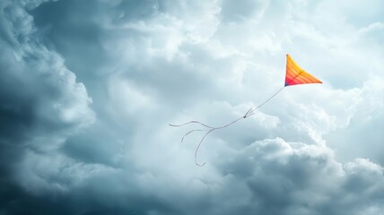 Colorful kite soaring through dramatic cloudy sky, symbolizing freedom and adventure on a windy day.