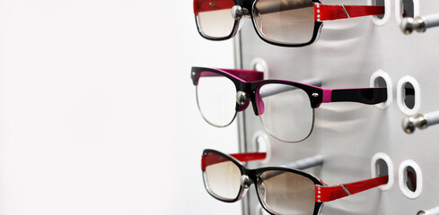 Glasses on a stand in a store, sale of optics