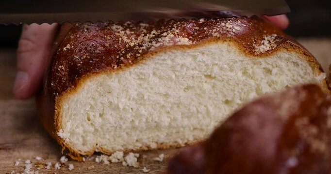 a loaf of wheat flour on the table, using white bread for cooking closeup