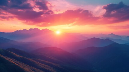 Fototapeta premium Breathtaking Sunset Illuminating Majestic Mountain Range with Vibrant Hues and Tranquil Atmosphere