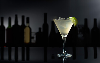 Cocktail Daiquiri on a black table in a bar.