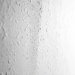 Obraz premium Textured White Wall: A Close-Up View of a Painted Surface with Subtle Shadows and Depth, Minimalist Abstract