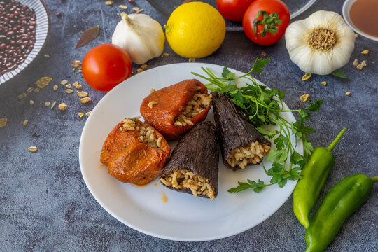 Dried eggplant stuffed and dried pepper stuffed with rice, tomato and olive oil known as dolma. (Turkish name; kuru biber dolmasi, kuru patlican dolmasi)