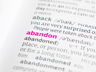 Fototapeta premium Exploring the definition and various connotations of the word abandon.