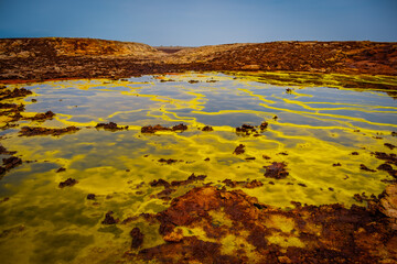 Acid pool with sulfur and iron deposits in Dallol in the Danakil depression, Ethiopia