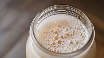 Close-Up of Bubbling Brine in Fermentation Jar Capturing the Process of Natural Fermentation