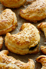 Close up view puff pastry crescents with vegetarian filling
