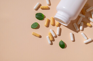 Minimalistic concept of vitamins, dietary supplements, nutraceuticals. Capsules, pills, tablets,...