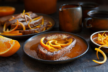 Torrijas de Semana Santa - traditional homemade Spanish dessert with orange sirup in Easter
