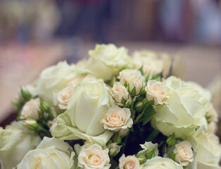Bouquet of light pink and white roses. Wedding party in a marine style.