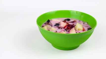 Sop buah or Es Buah is mixed fruit with coconut or simple syrup, served with shaved ice and add...