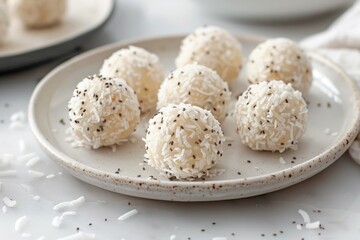 Coconut bliss balls on white plate, soft natural lighting. Artificial intelligence image