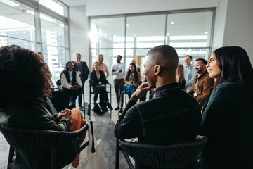 Multiethnic team workshop: Collaboration in a modern office
